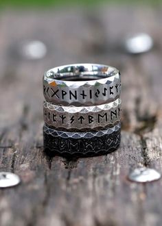 ⚔️ Unleash your inner warrior with our Stainless Steel Viking Rune Ring! ⚡️ Crafted with the strength of stainless steel and the wisdom of ancient runes, this ring is more than just an accessory—it's a symbol of power and resilience. 💪🔮 Let the mystic symbols guide your path as you conquer your daily battles with style and confidence. 💥 Whether you're raiding dungeons or conquering the office, this ring is your trusty companion. 🏰 Embrace the spirit of the Norsemen and let your fingers tell Black Viking Jewelry For Outdoor, Black Viking Style Jewelry For Outdoor, Black Viking Style Outdoor Jewelry, Viking Style Adjustable Jewelry Ring, Adjustable Viking Ring Jewelry, Adjustable Viking Jewelry Ring, Adjustable Viking Style Ring Jewelry, Adjustable Silver Viking Ring, Viking Style Engraved Adjustable Rings