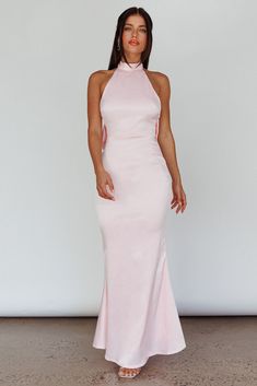 Party Gown With Tie Back, Maxi Length, Party Tie-back Maxi Gown, Tie Back Maxi Dress For Prom Party, Evening Fitted Maxi Dress With Bow Tie Back, Fitted Evening Maxi Dress With Bow Tie Back, Fitted Maxi Dress With Bow Tie Back For Evening, Pink Backless Halter Dress For Formal Events, Prom Halter Tie-back Maxi Dress, Chic Tie Back Gown For Party