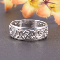 "Unique 925 sterling silver womens filigree wedding band, Simple & elegant art nouveau wedding band for her, Dainty art deco wedding band This is a stunning, feminine ring that works well for all occasions, styles, and ages. You will love it! Ring information Metal type: Silver Metal stamp: 925 Sterling SIlver Customization / Replacements It's easy to create jewelry that's perfect for you. Change the materials to suit your style and budget: Ruby, Emerald, Blue Sapphire, Amethyst, Topaz, Garn Elegant Bands With Intricate Design For Gift, Sterling Silver Wide Band Wedding Jewelry, Elegant Band With Intricate Design For Gift, Wedding Bands With Intricate Design In Sterling Silver, Elegant Wide Band Ring Stamped 925, Elegant Band With Intricate Design As Gift, Elegant Engraved Bands For Promise Ring, Silver Filigree Ring With Decorative Band For Wedding, Silver Filigree Wedding Ring With Decorative Band