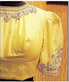 Light yellow Maggam blouse with Silver Zardozi and Pearl work all over sleeves and neckline. This blouse can be made in any color of your choice. Disclaimer - Actual colors may vary slightly due to computer monitors displaying settings. We try hard to match exact color. For sizes 42+ we charge extra $20 for fabric and workmanship. Please contact us before placing order, we will send you link to pay extra $20. Note: Front neck line design will be on one side only except for the blouses which has Maggam Blouses, Maggam Blouse, Motif Embroidery, Sari Design, Pattu Saree Blouse Designs, Pearl Work, Try Hard, New Blouse Designs, Elegant Blouse Designs