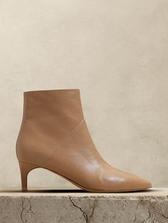 We dreamed up the perfect everyday boot, opting for a minimalist silhouette to better showcase beautiful Italian leathers.  A pointed toe and kitten heel add modern, sculptural touches.  Italian leather uppers, lining, and soles.  Side zip closure.  Made in Italy.  B Width.  Heel height: 2. 4" (6cm) Everyday Boots, Kitten Heel, Leather Ankle Boots, Italian Leather, Side Zip, Banana Republic, Kitten Heels, Heel Height, Ankle Boot