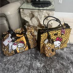 Hello Kitty Yellow Cheetah Rolling/Carry Trolley Handle Nylon Duffle Bag. Comes W/Packable Tote & Luggage Tag Duffle Bag Dimensions 21”L X 14”H X 5”D Packable Tote Dimensions 11”L X 14”H X 5”D And Hello Kitty Yellow Cheetah 3 Pcs Travel Bag Set Cosmetic Bag And Luggage Tag , 6 Items Total Hello Kitty Luggage ,Cheetah Travel Bag , Hello Kitty Carry Hello Kitty Yellow Cheetah Rolling/Carry Trolley Handle Nylon Duffle Bag Limited Edition Hello Kitty Luggage, Hello Kitty Bags, Travel Bag Set, Hello Kitty Bag, Luggage Tag, Bag Set, Luggage Tags, Yellow Black, Random Things