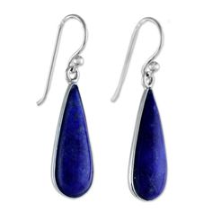 Presented by Michael Krainer of Thailand, these stunning hook earrings are set in rhodium plated sterling silver, with vibrant drops of blue lapis lazuli hanging in luxurious splendor. Rhodium plated sterling silver, sterling silver hooks, lapis lazuli Hook earrings High polish finish Rhodium-plated Handmade in & fairly traded from Thailand Due to the handmade nature of this item, color may vary slightly: Lapis Lazuli Dangle Earrings Jewelry Set, Silver Lapis Lazuli Pierced Earrings, Blue Lapis Lazuli Teardrop Earrings, Silver Lapis Lazuli Gemstone Earrings, Nickel-free Lapis Lazuli Dangle Earrings, Lapis Earrings, Paw Print Jewelry, Fair Trade Jewelry, Ribbon Jewelry