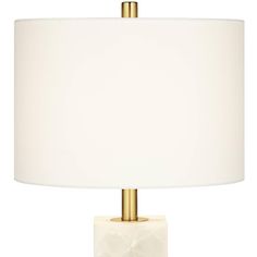 a table lamp with a white shade on it