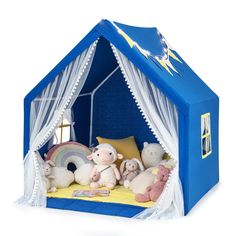 a blue tent with stuffed animals in it