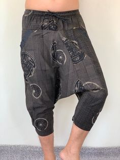 "Street Samurai Style Pants, Unique style Ninja pants are comfortable, Samurai pants, Unique style ninja pants are comfortable to wear. Handmade with a very lovely pattern, it is easy to wear and great for many occasions. Fashion Street Style Pants, Handmade Ethically, Breathable, Unisex, Comfortable to Wear MATERIAL: Cotton/mixed fabric MEASUREMENT: Waist: 24\"- 40\" elastic waist Hip 48\" Length: 30\" ♥ PAYMENT We accept payments via PayPal only. ♥ Shipping : - All items will be shipped within Street Samurai, Street Style Pants, Samurai Style, Ninja Pants, Pants Unique, Samurai Pants, Fashion Street Style, Womens Trousers, Style Pants