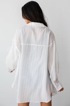 Look effortlessly cute for any casual occasion with a wardrobe essential like the Natural Sweetheart Pinstripe Oversized Button-Up Blouse! Effortlessly combining timeless sophistication with contemporary flair, this blouse is the epitome of chic versatility. Crafted from high-quality fabric, this blouse boasts a luxurious feel and impeccable craftsmanship. The oversized silhouette offers a relaxed fit that drapes elegantly over the body, creating a look that's both stylish and comfortable. The s Casual Pinstripe Button-up Tops, Spring Pinstripe Button-up Blouse, Blue Dress Accessories, Striped Oversized Button-up Blouse, Pinstripe Cotton Button-up Blouse, White Unstructured Button-up Top, White Long Sleeve Dress, Puff Sleeve Dresses, Casual Jumpsuit