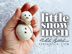 a hand holding a small snowman in it's left hand with the words little snow men written above it