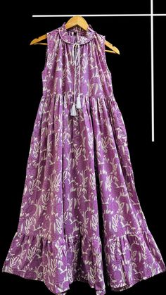 "Women's cotton lilac hand block floral printed A-line sleeveless ruffle collared neck, long maxi dress with pockets, gift for her, gift for mom, maxi dress, beautiful maxi dress, block print dress, Indian cotton dress seller, wholesale indian seller, vintage maxi  Feel beautiful and confident throughout your days wearing our block printed outfits, made with high quality soft and breathable cotton fabric.  The print on the dress is known as \"BLOCK PRINT\" which is centuries old technique of Indian textile carried out  by local artisans of Jaipur (INDIA). MEASUREMENTS (in inches): Size XXS-: Bust- 34″ | Shoulder- 13.5″ | Length- 51″ Size XS-: Bust- 36″ | Shoulder- 14″ | Length- 51″ Size S-: Bust- 38″ | Shoulder- 14.5″ | Length- 51″ Size M-: Bust- 40″ | Shoulder- 15″ | Length- 51″ Size L-: Printed Cotton Purple Dresses, Purple Cotton Printed Dresses, Purple Printed Cotton Dress, Bohemian Purple Cotton Maxi Dress, Purple Cotton Sleeveless Maxi Dress, Purple Sleeveless Cotton Maxi Dress, Lavender Floral Print Sleeveless Maxi Dress, Lavender Sleeveless Floral Print Maxi Dress, Lavender Cotton Dress With Floral Print