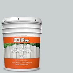 a white paint bucket with the words behrr house of greene wood stain on it