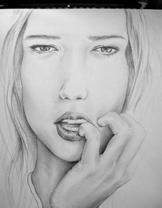 a pencil drawing of a woman's face with her hand on her chin, looking to the side