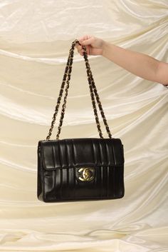 CONDITION: GOOD VINTAGE .?ÿ A?ÿChanel gem crafted in buttery soft lambskin with vertical quilting, and 24K gold plated hardware. It's a spacious bag with lots of room, and features the extra large turnlock logo. Currently going for $6k-$7k! Crafted in 1994-1996. Please note:?ÿMinor creasing on exterior leather, and slight rubbing on corners. Hardware in beautiful yellow gold! In order to meet the current demand and given the?ÿnature of sourcing inventory, all sales are final. Please be sure to review all pictures and ask any questions prior to making a purchase! To prevent any form of fraud, I?ÿkeep video records of?ÿmyself?ÿpackaging?ÿand dropping off each order, and?ÿall?ÿorders ship with?ÿtracking and?ÿsignature?ÿconfirmation. Please ensure your shipping address is correct as we are not Gem Crafts, Girl Backpacks School, Bottega Veneta Shoulder Bag, Handbag Wallet, Louis Vuitton Shoes, Dior Shoes, Wallet Accessories, Girl Backpacks, Bago