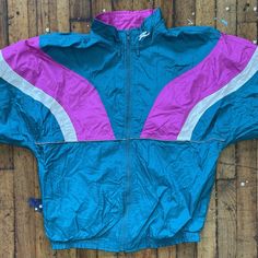 Vintage Road Runner Sports Multicolored Large Full Zip Nylon Windbreaker Jacket Sizes might vary in comparison to current day sizes  so please see photos for measurements and flaws before you purchase. These are mostly vintage items and so please keep in mind that  anything over 10 years old is most likely going to have some fading,  cracking, staining and small snags or holes.  We try and mention and photograph any flaws but sometimes might miss one. *These items are used, and sourced from a va 80's Clothes, 80s Outfit, Road Runner, Windbreaker Jacket, Puma Jacket, Nike Jacket, Vintage Items, Athletic Jacket, Road