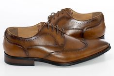 Cognac brown exterior and sweeping wingtip oxford-style lace give these shoes a rich, vintage look which is always appropriate for business or pleasure. Great for a classy, reserved look in the office or at prom. Oxford Style, Wingtip Oxford, Derby Shoes, Vintage Look, Vintage Looks, Cognac, The Office, Derby, Dress Shoes Men