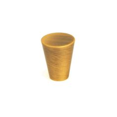 a small wooden cup sitting on top of a white table