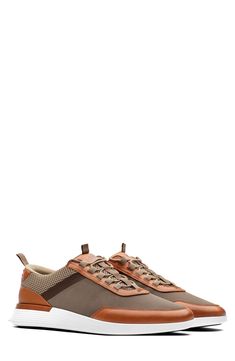 Crafted from full-grain Italian leather and airy mesh, this modern sneaker is a quick way to elevate everyday ensembles. Lace-up style Removable, cushioned insole with arch support Leather, textile and synthetic upper/textile and leather lining/rubber sole Imported Casual Sneakers With Perforations For Outdoor, Casual Outdoor Sneakers With Perforations, Casual High-top Mesh Sneakers With Textured Sole, Brown Mesh Sneakers With Rubber Sole, Modern Brown Sneakers For Outdoor, Outdoor Leather Sneakers With Perforations, Leather Sneakers With Perforations For Outdoor, Modern Mesh Sneakers For Outdoor, Dynamic Outdoor Leather Sneakers