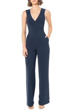 Stand tall whether you're off to the office or brunch in this stretch-kissed jumpsuit that gives you legs for days thanks to a high waist and long straight legs. 61 1/2" length Deep V-neck Sleeveless Partially lined 97% polyester, 3% spandex Machine wash, dry flat Imported Elegant Strapless Jumpsuit For Work, Formal Fitted Jumpsuits And Rompers Overall, Formal Fitted Overall Jumpsuits And Rompers, Elegant Wide Leg Strapless Jumpsuit For Work, Formal Fitted Jumpsuits And Rompers, Sleek Fitted Jumpsuits And Rompers For Formal Occasions, Formal Fitted Jumpsuit, Formal Fitted Elastane Jumpsuits And Rompers, Fitted Overall Pantsuit For Date Night