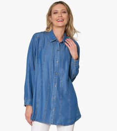 Stunningly designed and crafted using luxurious Tencel® denim, our Between The Lines Tunic is here to revolutionize the way you think of denim shirts! Featuring contrast top stitching, cut-up panels, and handy side seam pockets, this style makes a statement. Step up your style today! This is a limited production item produced in small quantities. If your selected size/color is currently sold out and pre-order is available, pre-order yours today to be first on the list for our next shipment! Denim Blue Tops For Layering, Denim Tops For Layering, Tencel Denim, Contrast Top, Denim Shirts, Be First, Cut Up, Top Stitching, Denim Shirt