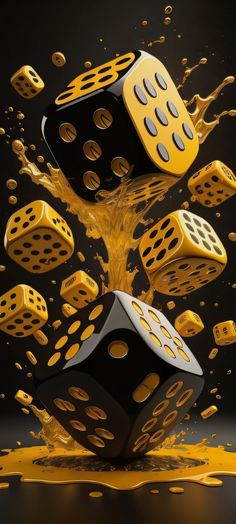 some dices are falling into the water and splashing on them with orange liquid