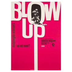 a pink poster with the words blow up written in white on it's side