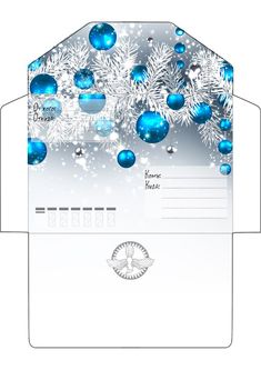 a white envelope with blue ornaments and snowflakes on the inside, in an envelope