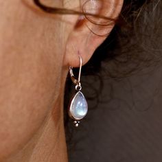 "Sterling silver Moonstone dangle earrings, Teardrop Moonstone earrings, Simple everyday earrings, Birthstone earring. Also available with- Garnet, Blue Opal, White Opal, Labradorite, and in Gold plating. ♥ ♥ ♥ Moonstone- Encourages hope, enhances feminine energies, sensitivity, intuition, and psychic abilities. Known to bring strong energies of abundance to one's life. 🌸 Product details: Handmade necklace 🌸 Measurements: weight-4.1gr. Drop size- 0.78\"X0.39\" (20X10mm) Stone Diameter - 0.39\" Earrings Long Silver, Silver Wire Earrings, Long Silver Earrings, Amethyst Gold, Moonstone Earrings, Sterling Silver Dangle Earrings, Birthstone Earring, Earrings Long, Opal Earrings