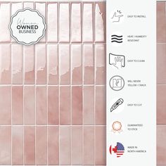 a pink tiled wall with different types of items on the tile and below it is a white sign that says owned business