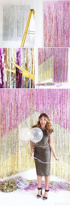 a woman is standing in front of some tinsel and streamers hanging from the ceiling