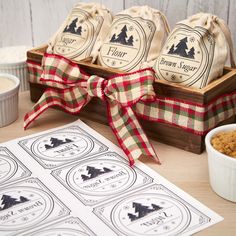 three bags of brown sugar sitting on top of a table next to bowls and spoons