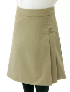 School Uniform Skirt for Girls by Dressing For His Glory The School Uniform Skirt for Girls sizes by Dressing For His Gloryhas two off centered pleats in the front and back. It has a single button front closure with a small pocket. The skirt has a flat front waistband and you will love the back adjustable elastic waist. The skirt is comfortable extremely durable, stain resistant, and great looking the entire school year! Fabric Content: 65% Poly / 35% Cotton Care Instructions: Machine Wash, Tumb Classic Skort For School, Classic School Skort, Spring School Uniform Skort With Pockets, Lined Skort For School, Lined Skirt Skort For School, School Uniform Skirt With Pockets, School Skort With Pockets, Solid School Skirt With Pockets, Skirted Skort With Pockets For School