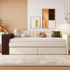 a living room filled with furniture and a white rug on top of a hard wood floor