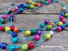 "Multicolor necklace from wooden beads. Length: 30\"/76cm + 4\" (10cm) the chainlet. The matching earrings is here https://www.etsy.com/listing/849740848/wooden-earringssingle-bead-earringswood?ref=shop_home_active_1 About shipping: the item will be carefully packed in box and shipped via air mail. If you have questions - feel free to contact me. *Back to my shop https://www.etsy.com/shop/IrinaJewelryBox?ref=hdr Thank you for visit." Multicolor Wooden Beads Long Necklace Gift, Multicolor Wooden Beads Long Necklace, Multicolor Long Necklace With Wooden Beads, Bohemian Rainbow Beaded Necklaces With Wooden Beads, Bohemian Rainbow Beaded Necklace With Wooden Beads, Colorful Adjustable Necklaces With Wooden Beads, Rainbow Beaded Necklaces With Wooden Beads As Gift, Adjustable Rainbow Beaded Necklace With Wooden Beads, Adjustable Rainbow Beaded Necklaces With Wooden Beads