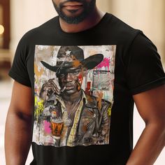 Introducing our Black Cowboy Tee, featuring a captivating cartoon style graffiti collage design that is both edgy and Afrocentric. This unique cowboy shirt celebrates African American culture in a bold and vibrant pop art style. Stand out from the crowd with this eye-catching tee that is both stylish and culturally significant.  Perfect for those who appreciate art, history, and individuality, this African American tee is sure to make a statement wherever you go. Add a touch of creativity to you Graffiti Collage, African American Culture, Cowboy Shirt, Black Cowboy, Culture Club, Pop Art Style, Cowboys Shirt, American Culture, Collage Design