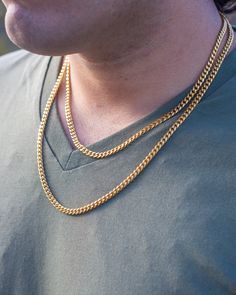 A staple in the hip-hop jewelry movement, the Miami Cuban links first became popular in the late 70's to mid-80's. Whether you have a pendant you want to wear, or just need a chain to add a bit of shine to your fit, the Miami Cuban chain is the perfect accessory for any occasion. We stand by the quality and craftsmanship of our merchandise. All of our products are plated with high quality 14-18 karat gold, and if applicable, feature handset stones.  Our Miami Cuban Link Chains are 5 times PVD plated with 18K Yellow or White Gold, to ensure there's no fading. Material: Stainless Steel Finish: 18K Gold Gold Cuban Link Necklace For Streetwear, Gold Cuban Link Necklace With Curb Chain For Streetwear, Streetwear Necklaces With Cuban Link Box Chain, Streetwear Necklaces With Box Chain And Cuban Link, Cuban Link Box Chain Necklace For Streetwear, Gold Rope Chain Jewelry For Streetwear, Gold Rope Chain Jewelry, Gold Cuban Link Jewelry For Streetwear, Gold Chain Link Jewelry For Streetwear