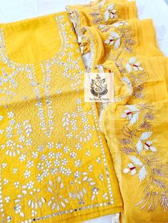 Item Overview ATHARVA Hand Embroidery Salwar Kameez/Yellow Chanderi/Elgant Gota Patti Border Chiffon Dupatta/Custom Stitch Unstitch/Custom Anarkali Dno. CH1710 Fabric: * Shirt Chanderi Silk 2.5 Mts, yellow/Neck Embroidery * Dupatta:Chiffon Chinnon, Yellow, Elegant Gota Patti border Dupatta 2.5 Mts. * Bottom Santoon Silk 2.5 Mts. Excusive Hand Embroidered Party Wear Punjabi Suit. Customization: * Fabrics Customization: Designs Can be made in different Fabrics. *Color Customization: Designs Can be Yellow Bollywood Style Kurta With Cutdana, Yellow Bollywood-style Kurta With Cutdana, Yellow Bollywood Kurta With Cutdana, Bollywood Style Yellow Kurta With Cutdana, Yellow Chanderi Kurta With Cutdana, Yellow Sharara With Cutdana And Straight Kurta, Yellow Sharara With Straight Kurta And Cutdana Details, Semi-stitched Yellow Kurta With Gota Work, Designer Yellow Kurta With Chikankari Embroidery