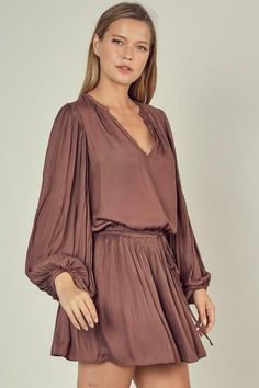 Add Boho-chic style to your wardrobe with the By The Way Truffle Balloon Sleeve Mini Dress! Silky woven fabric, in a truffle brown hue, shapes this adorable dress that features a mandarin collar, V-neckline, and relaxed-fit bodice, framed by long balloon sleeves (with pleated detail and elasticized cuffs). Elasticized, drawstring waist atop a flirty pleated A-line mini skirt. Lined. DETAILS & CARE Polyester. Rayon lining. Machine wash cold. Imported. Boutique Boho, Boho Pink, Boho Boutique, Balloon Sleeve Dress, Boho Outfit, Boho Chic Style, Pleated Mini Dress, A Line Mini Skirt, Bohemian Clothing