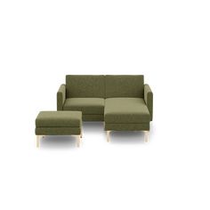 a green couch and ottoman sitting next to each other