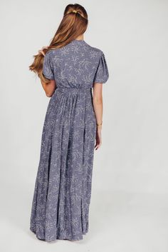 This gorgeous, feminine maxi is the easiest thing to wear for summer holidays and backyard barbeques. We love its lightweight ease and elegant floral pattern, and its front button placket gives it a classic quality you'll love wearing year after year. Available in two colorways. FIT: Runs true to size. MATERIAL: Viscose. GARMENT DETAILS: Lightweight floral maxi dress with a full front button placket, collared V-neckline, and short sleeves. Features a pleated front, in-seam pockets, and lining. S Garment Details, Curve Model, Nursing Friendly, Summer Holidays, Elegant Floral, Floral Maxi, Floral Maxi Dress, Button Placket, Chambray