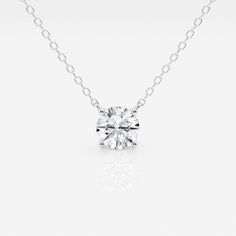 a diamond necklace on a white background