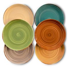 four different colored plates stacked on top of each other