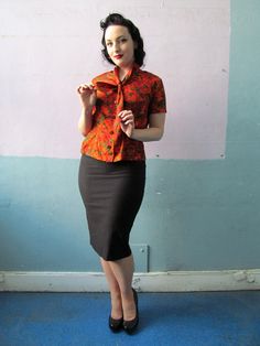 "Super cute novelty print silky blouse from the 1940s. Button up style with an ascot tie collar. Elastic inserts at the waist sides add a bit of flex room in the waistline. Measurements: // Shoulders: up to \" taken flat Bust: 40\"max Waist: 30\" to 32\" max Length: 22\"" 40s Blouse, 1940 Style, Ascot Ties, Rockabilly Girl, Foxy Brown, Tie Collar, Flex Room, 70s Disco, Silky Blouse