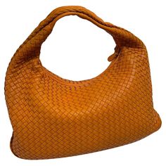 Bottega Veneta Veneta Hobo Medium Orange Intrecciato Leather Bag 47cm These are professional photos of the actual bag. This Bottega Veneta Veneta Bag is an exceptional piece of luxury, crafted from iconic lambskin leather with the instantly recognizable Intrecciato weave. This bag is roomy enough for all your essentials, it's the perfect accessory for stylish and effortless everyday looks. CONDITION: NEVER WORN DETAILS: Bottega Veneta Veneta Medium Dimensions: Width 47cm, Height 30cm, Depth 3cm Color: Orange Lambskin leather Structured Shoulder, Professional Photos, Professional Photo, Lambskin Leather, Fashion Handbags, Bottega Veneta, Everyday Look, Leather Bag, Shoulder Bag