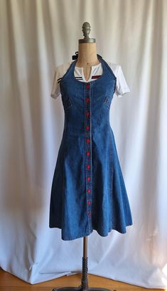 A rare find  70s denim dress with buttons  Tie back Shirt sold separately  Label - Genuine and authentic Landlubber Boston Massachusetts  US size 4 to 6 Shown on a size 6 mannequin Measures - 36" bust 30" waist  40" hips  39" length (approximately) Excellent vintage condition 90s Denim Dress, Tie Back Shirt, 70s Denim, Dress With Buttons, Back Shirt, 90s Denim, Boston Massachusetts, Dress Clothes For Women, Fitted Dress