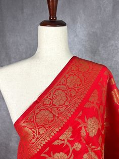 Red Color Dupatta with Floral Jaal design with red color tassles on both the ends of the dupatta. Perfect Gift !! Very Light Weight Item: DupattaBase color Red Fabric : Silk (Not Pure Silk)Work : Zari Weaved with tasselsLength of the Dupatta : 88 inches approx.Width of the dupatta : 33 inches (Approx.)Store Policies- No return or exchange will be accepted for color variations.- No return or exchange will be accepted if the color does not match your other clothing or your partners or anyone else.- Since this Dupatta is handmade hence little inconsistencies may be there however it is not considered as a defect.- Zari or thread coming out or on folds is not considered as defects.- Slight variation in actual color vs. image is possible due to the screen resolution. Color might look different i Red Brocade Dupatta For Navratri, Red Brocade Dupatta For Diwali, Elegant Red Dupatta For Puja, Red Brocade Saree For Puja, Red Dupatta For Festivals, Red Traditional Wear With Motifs For Celebration, Red Brocade Saree For Transitional Season, Red Traditional Wear With Traditional Patterns For Celebration, Red Brocade Traditional Wear