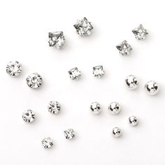 Add a touch of sparkle to your ears without the piercing! This set of magnetic earrings includes faux crystal and ball studs in different shapes and sizes. Finish: Silver-tone Closure: Magnetic Pack Size: 9 Material: Plastic Suitable for ages 8+ - Claire's Silver Graduated Crystal Ball Magnetic Stud Earrings - 9 Pack Magnetic Earrings Studs, Silver Earrings Pack, Claires Earrings, Magnetic Earrings, Packing Jewelry, Fashionable Jewelry, Birthday List, Jewelry And Accessories, Kind Heart