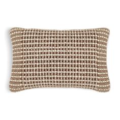 a brown and white checkered pillow on a white background