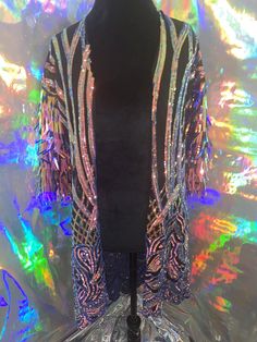 Please advise, Must be worn with care. Sequins may fall out if tugged or worn roughly. Perfect for music festivals and nights out with friends! For Jackets size please review size chart in photos. Please list size and comment box at check out or send DM. Custom sizing available. Please advise, Must be worn with care. Sequins may fall out if tugged or worn roughly. Metallic Disco Outerwear For Party, Metallic Sequined Outerwear For Party, Metallic Sequined Party Outerwear, Metallic Sequin Party Outerwear, Disco Sequin Outerwear For Fall, Disco Sequined Outerwear For Party, Sequin Disco Outerwear For Party, Disco Party Outerwear With Sequins, Disco Sequin Party Outerwear