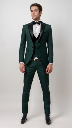 Stand out from the crowd at your formal events with the custom forest green tuxedo suit, crafted from the most comfortable and durable fabrics. This bold and striking tuxedo features a rich green hue that is sure to turn heads, while the black lapel on the jacket and waistcoat adds an element of sophistication and elegance to the design. Perfect for the modern gentleman who isn’t afraid to make a statement, our green tuxedo is the ultimate choice for any formal occasion. #greentuxedo #greentux Fitted Green Tuxedo For Semi-formal Events, Elegant Green Three-piece Suit For Party, Elegant Green Three-piece Party Suit, Elegant Tailored Green Tuxedo, Fitted Green Three-piece Suit For Party, Fitted Green Tuxedo For Groom, Green Fitted Tuxedo For Groom, Green Fitted Tuxedo Suit, Elegant Green Tuxedo For Semi-formal Occasions