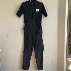 Nike Air Jordan Black Track Jumpsuit Size: Small Details: New With Tags. Really Cute Fit. Nike Jumpsuit Women, Nike Air Jordan Black, Nike Romper, Black One Piece Jumpsuit, Air Jordan Black, Club Jumpsuit, Hot Pink Romper, Plus Size Sportswear, Grey Jumpsuit