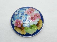 Vintage Hanazume Cloisonne Brooch, Blue & Pink Flowers, Enamel, Cloisonne Pin, Floral Brooch - Beautiful Note: good condition, gently worn. See photos for size GIFT WRAPPING AVAILABLE AT CHECKOUT ❀---✿--❀---✿---❀---✿--❀---✿---❀--✿--❀---✿---❀---✿--❀---✿--- Email me with any questions PRIOR to purchase ❀---✿--❀---✿---❀See policies❀---✿--❀---✿---❀ ❀---✿--❀---✿---❀---✿--❀---✿---❀--✿--❀---✿---❀---✿--❀---✿--- Your item will ship within 7-10 days from date of purchase. Expedited Shipping is Extra I wil Blue Round Brooch For Gift, Blue Round Brooches For Gifts, Round Blue Brooches For Gifts, April Ideas, Cloisonne Jewelry, Texas City, Beautiful Notes, Floral Brooch, Celtic Designs